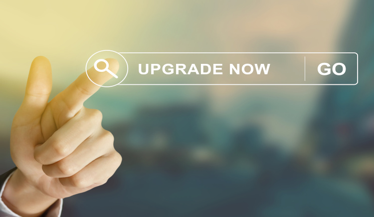 Finger pointing to "Upgrade Now" text