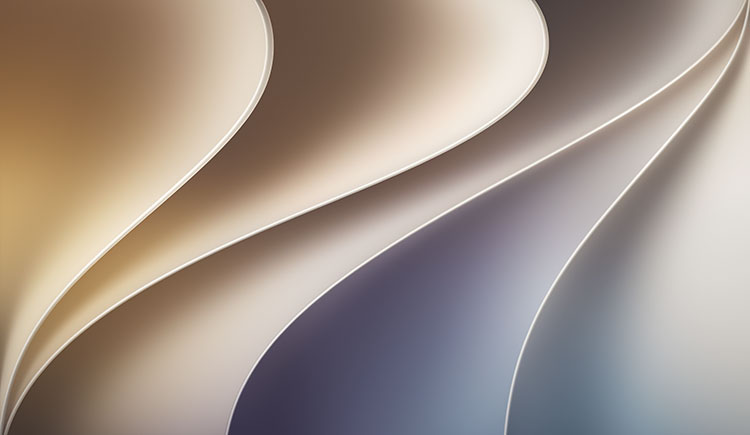 The macOS Tahoe default wallpaper: smooth, glossy ribbons curving across the frame in gold, silver, and muted blue.