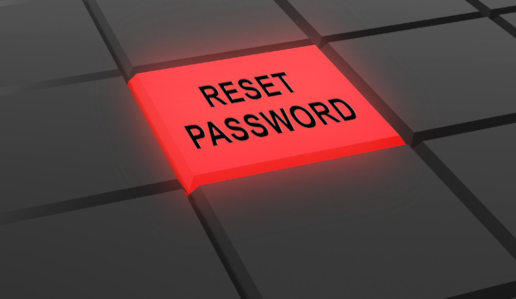Red reset password key on keyboard