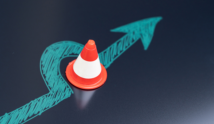 Illustration of a detour around a traffic cone